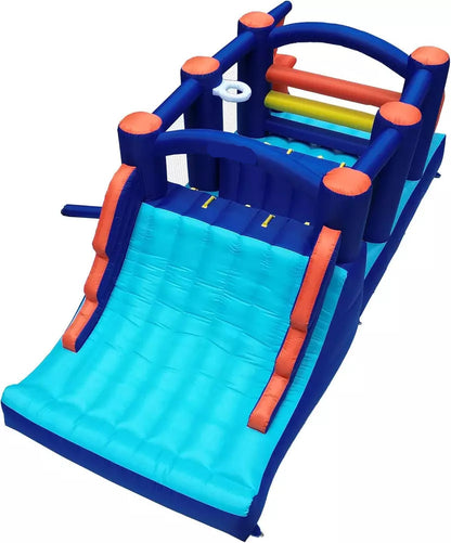 Casa de rebote inflable con curso de obstáculos y tobogán