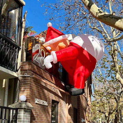 Père Noël gonflable grimpant de Noël en pack blanc